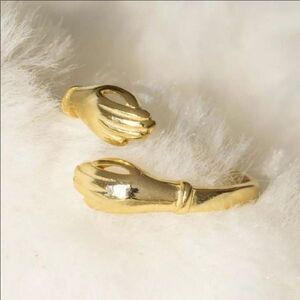 The Hold Me Close hand holding” or hug”  adjustable ring in 18k